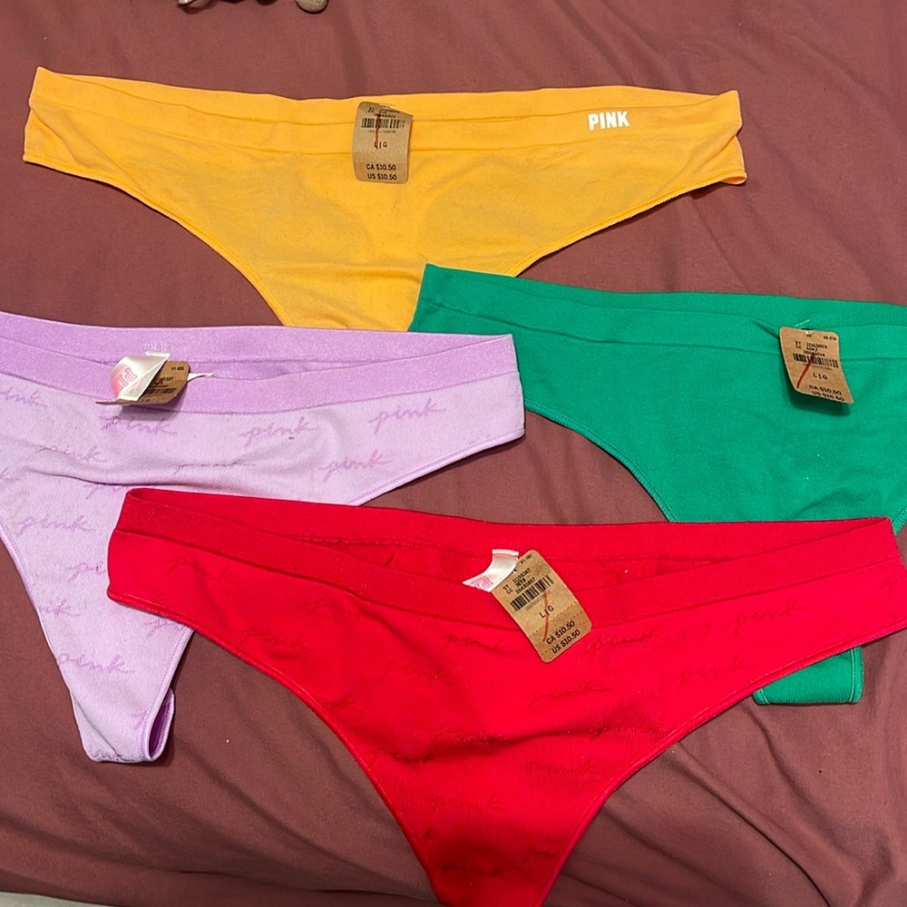 NEW WITH TAGS (Size L) PINK Victoria Secret soft material thongs.Assorted colors